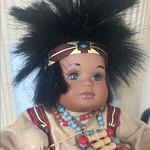 Handcrafted Brown Doll with Black Hair and Colorful Beaded Outfit